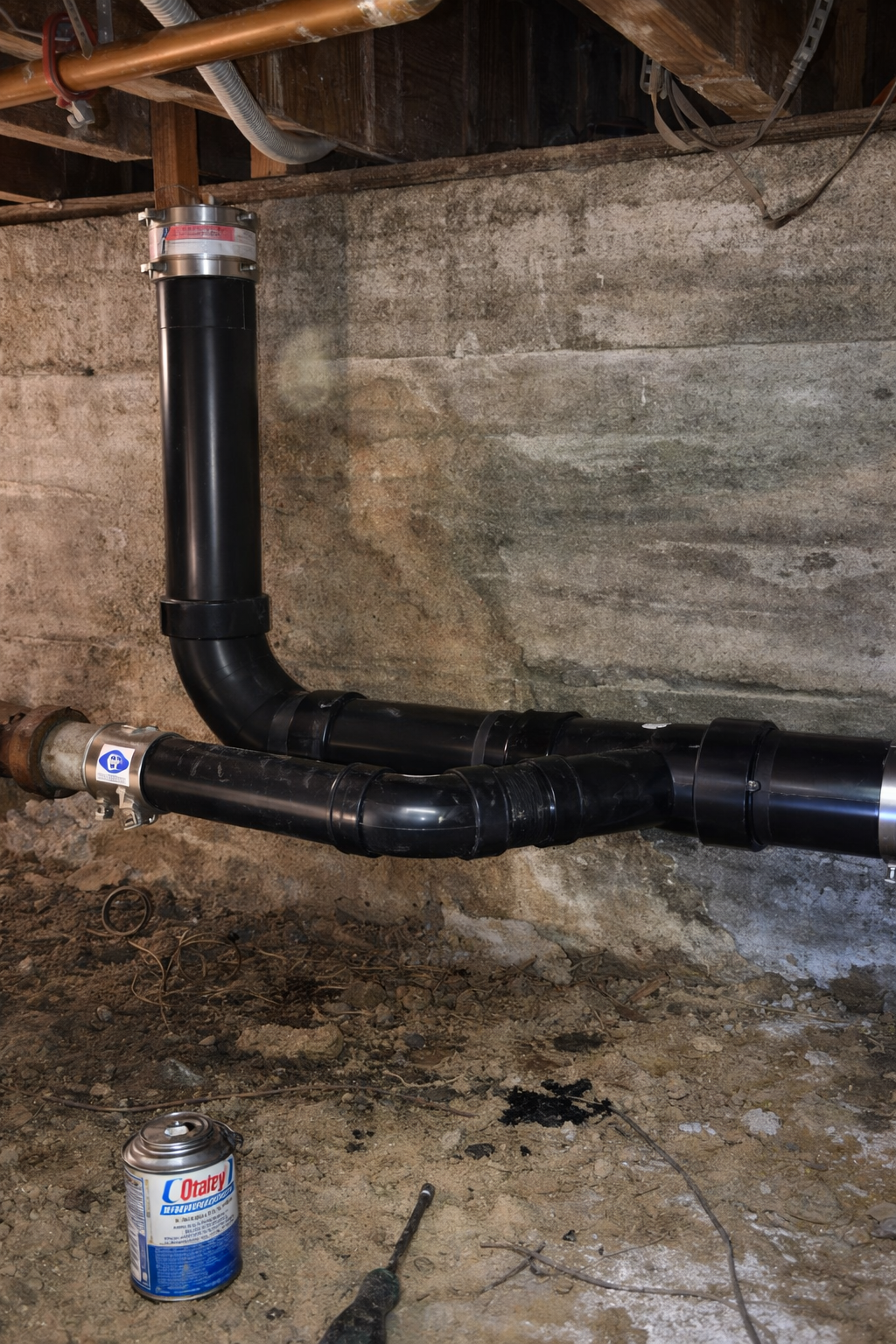 Crawlspace drain line replacement using ABS piping